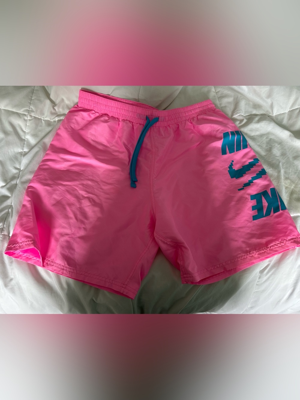 Nike Men’s Neon Pink Swim Trunks with Blue Accents